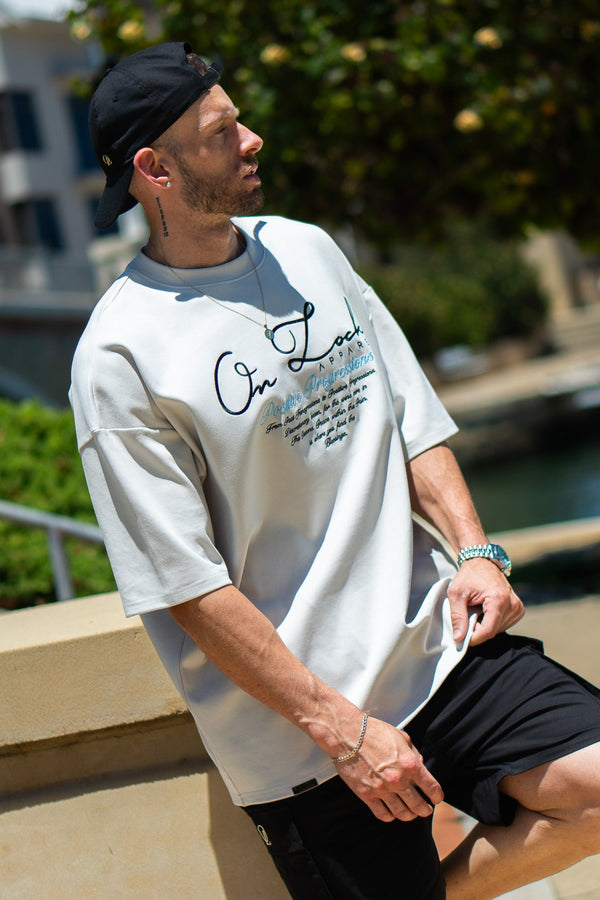 POSITIVE PROGRESSIONS TEE - PLATINUM